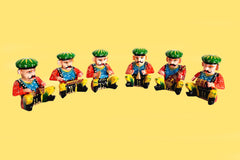 A wooden showpiece set of musicians wearing safa (turban), ideal for home and office decor.