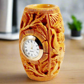 A multi-utility table clock and pen stand made of fine quality wood with nice carving.