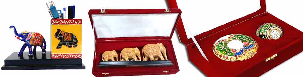 Handmade corporate gifts from Jaipur — wooden desk organizer, marble pen holder, and Meenakari elephant for employees and clients