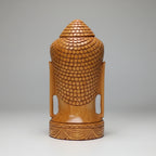 Bottom view showing the stable 10cm circular base of the cylindrical Buddha head sculpture, highlighting the solid hardwood construction.