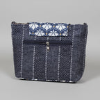 Side profile showing the 10 inch length and 8 inch height of the Jacquard bag
