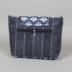 Side profile showing the 10 inch length and 8 inch height of the Jacquard bag