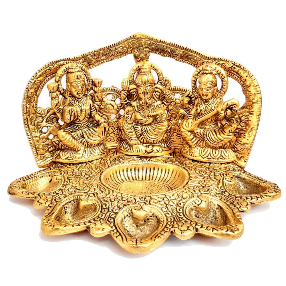 A 12cm golden metal idol with a Panch Deepak and dhupbatti stand, perfect for a puja room.
