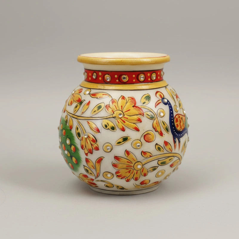A 13cm marble Kalash pot featuring an ornate carved finish, suitable for storing holy water or as a decorative spiritual centerpiece.