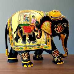 An 18cm handcrafted wooden elephant showpiece, a stunning piece of decor for any space.