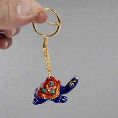 Handcrafted metal tortoise keychain in traditional Meenakari art