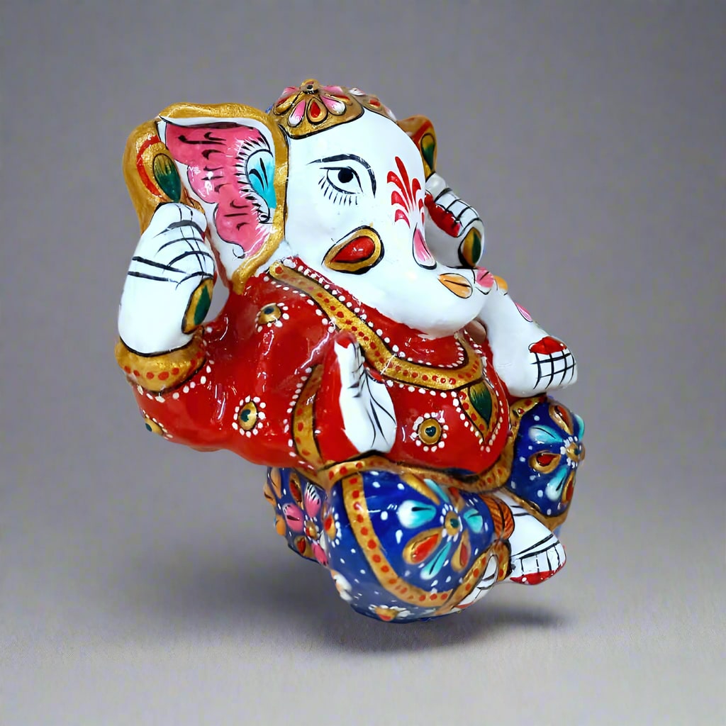 Vibrant meenakari Ganesha figurine symbolizing divine blessings