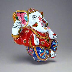 Vibrant meenakari Ganesha figurine symbolizing divine blessings