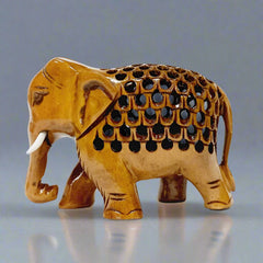 Brown wooden elephant statue featuring artisan undercut craftsmanship