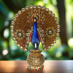 Intricate wooden peacock figurine with lac and embellishments