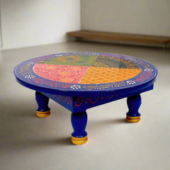 Wooden round chowki with colorful artistic patterns for rituals