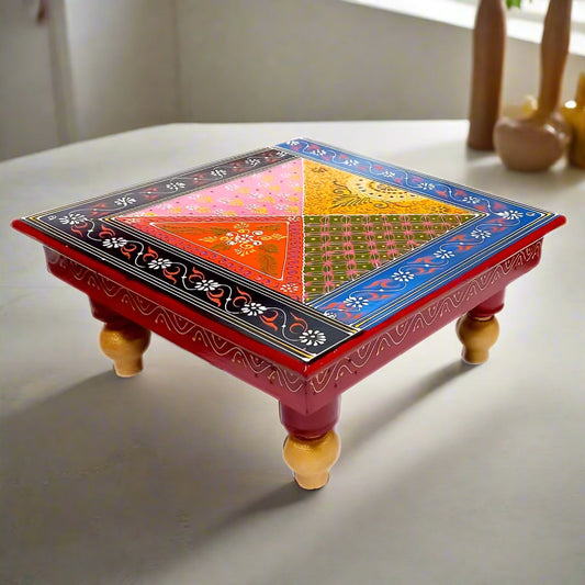 Hand-painted wooden chowki with intricate embossed floral designs