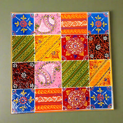 Artisan-crafted wooden mukkali featuring detailed floral embossing
