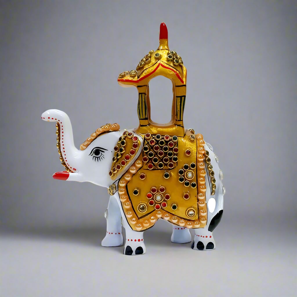 Hand-painted metal elephant with vibrant patterns and detailed craftsmanship