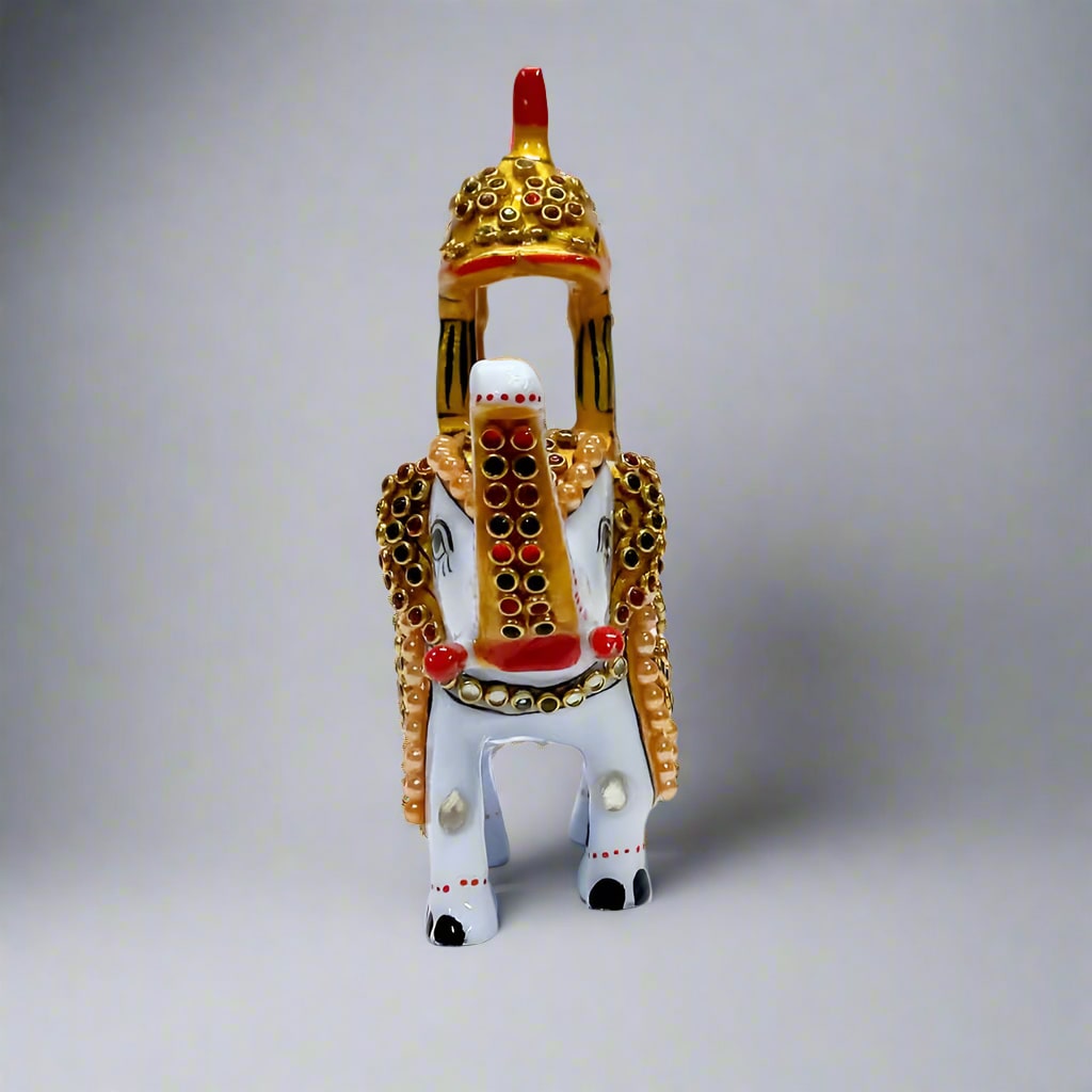 Decorative metal elephant figurine featuring traditional Ambabari design