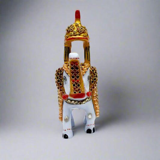 Decorative metal elephant figurine featuring traditional Ambabari design