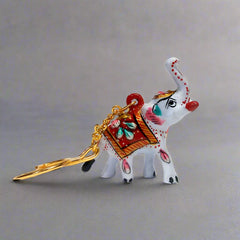 Elegant Meenakari white elephant keychain crafted from durable metal.