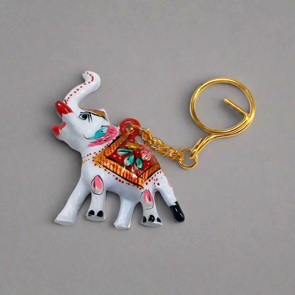 Hand-painted Meenakari keyring featuring a white elephant design.
