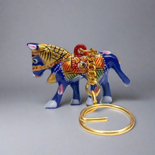 Elegant metal horse keyring featuring traditional Meenakari artwork.