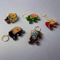 Decorative elephant-shaped wooden keyring for stylish daily use.