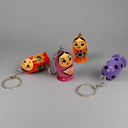 Lightweight wooden keychain featuring charming doll figure for daily use.