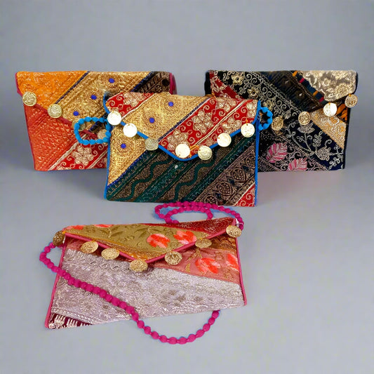 Colorful patchwork clutch bag handcrafted in traditional Jaipuri style with vibrant cotton fabric