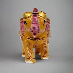 Elegant wooden elephant sculpture with raised trunk for good fortune, detailed embossed painting, and miniature elephant artwork on the side.