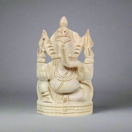 Handcrafted Sevan wood Ganesh statue with intricate details, radiating positive energy and spiritual blessings
