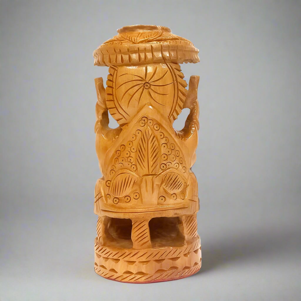 Elegant wooden Ganesh idol featuring traditional craftsmanship and umbrella motif