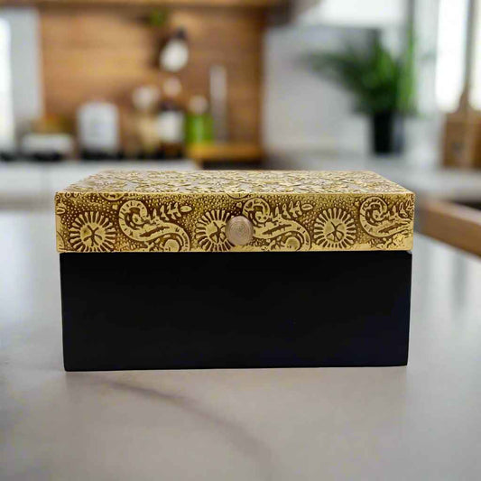 Traditional Indian design, this box combines natural wood texture with engraved brass accents, offering both utility and old-world aesthetics.