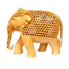 A 20cm wooden elephant figurine with beautiful Jali work, perfect for home decor.