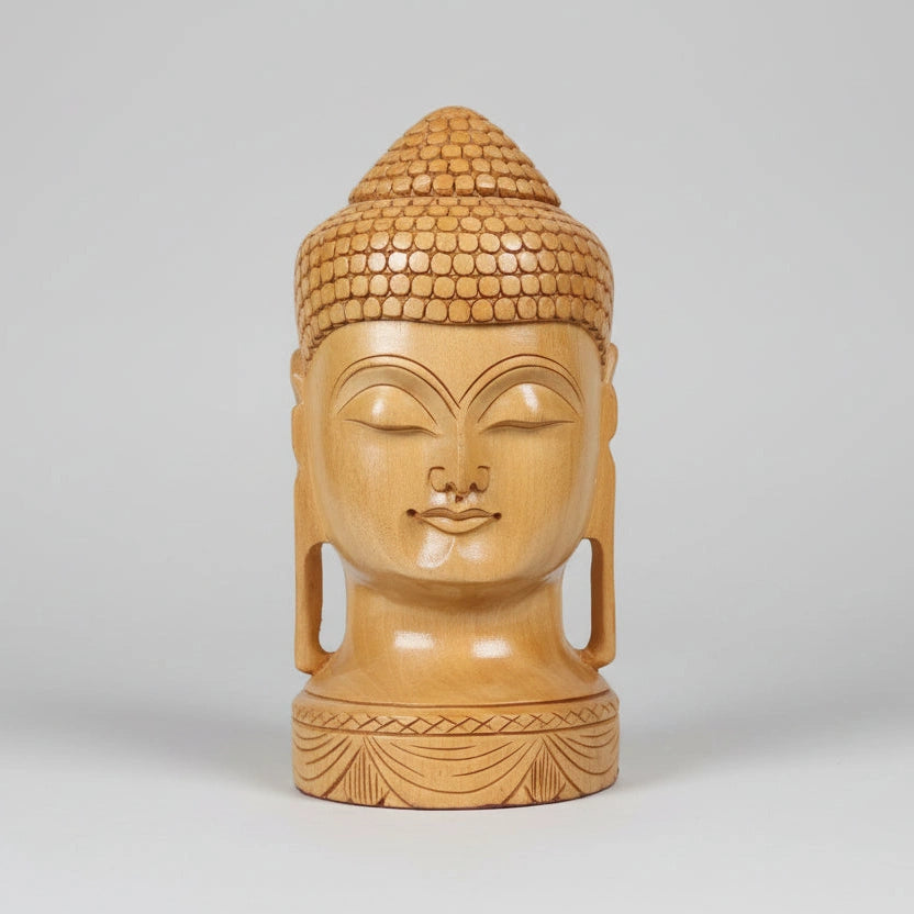 Frontal view of a 20cm hand-carved Kadamba wood Buddha head showing symmetrical facial features and a polished natural grain finish.