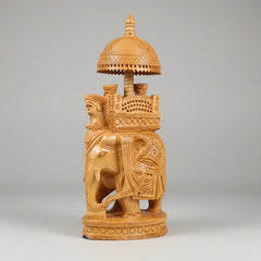 A 23cm tall traditional wooden Ambabari elephant showing the scale and height for office desk decor.