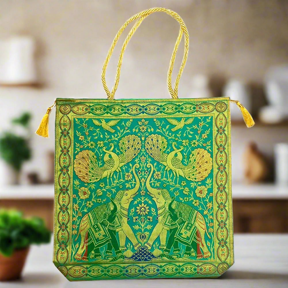A 41cm silk handbag with fine quality zari work and assorted designs and colors.