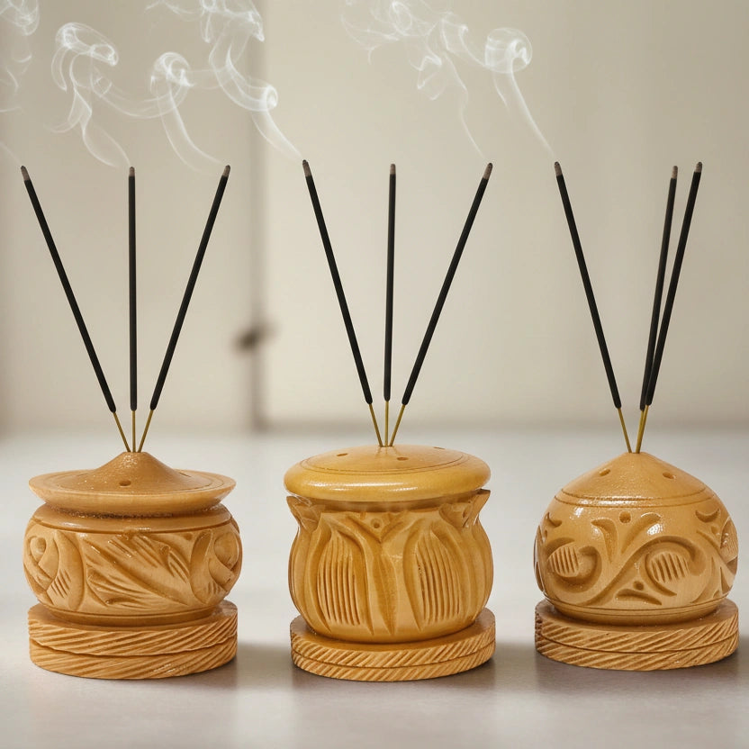 Exquisitely carved wooden agarbatti stand with 5 holes to hold incense sticks securely.