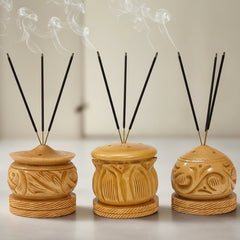 Exquisitely carved wooden agarbatti stand with 5 holes to hold incense sticks securely.