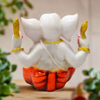 Beautifully detailed Ganesha idol with artistic hand-painting, perfect for spiritual gifting and festive decoration.