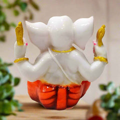 Beautifully detailed Ganesha idol with artistic hand-painting, perfect for spiritual gifting and festive decoration.
