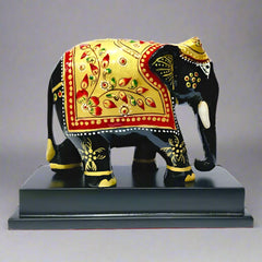 Wooden elephant memento with artistic hand painting and carvings