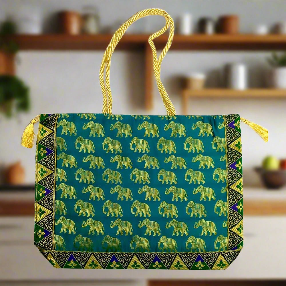 An amazing design Banarasi silk handbag with a sturdy handle and vibrant colors.