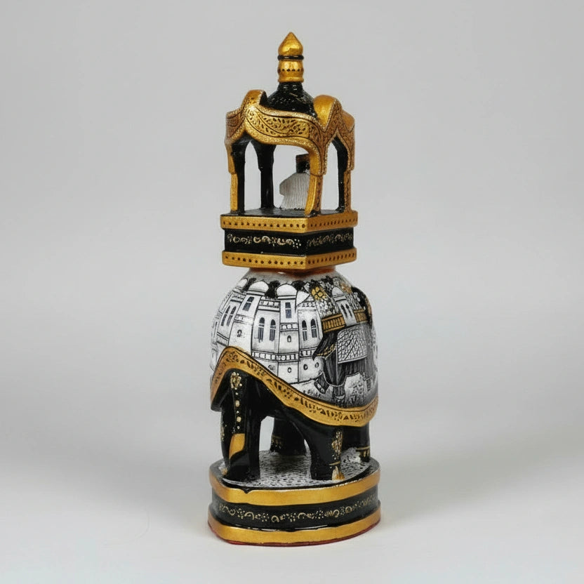 Rear view of a 20cm wooden Ambabari elephant showing continuous hand-painted miniature art.