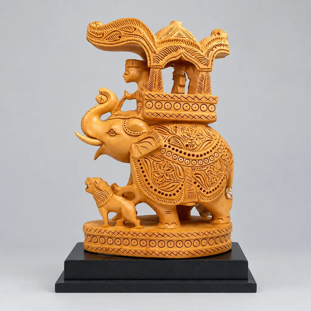 Wooden Ambabari elephant with floral carvings, a raised trunk, an ornate canopy and a small lion figure on a black display base.