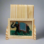 Elegant wooden phone stand with gemstone inlay, ideal for all smartphones