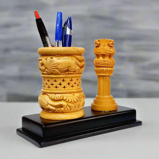 Handmade wooden pen stand with Ashok Pillar style craftsmanship.