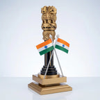 Angled view of handcrafted wooden Ashoka Stambh with crossed tricolour flags, dark brown column and golden platform