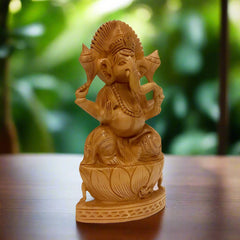 An auspicious handmade wooden Ganesha statue, a perfect addition to your home or office.