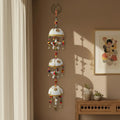 Ethnic Bamboo Basket Wind Chime Wall Hanging with Gold Medallion Detailing, Star Connectors and Brass Cow Bell