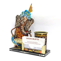 A beautiful Ganesha-themed pen stand that serves as both an office decoration and a utility item.