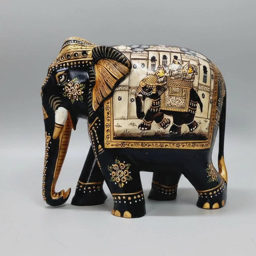 Black elephant figurine front view with golden miniature painting