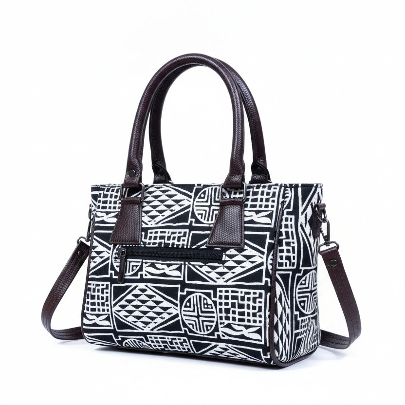 Back view showing the secure exterior zip pocket on the black 10x8 handbag.